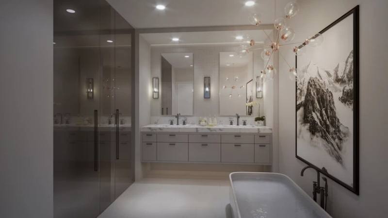 Michael London Design: Home Lighting Design. This modern bathroom has a white vanity, a white bathtub, and a gold suspension chandelie