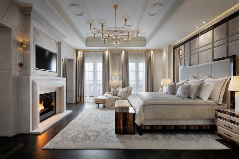 Home lighting design with Ferris Rafauli Design. This bedroom has one suspension chandelier with balls and a gold structure.