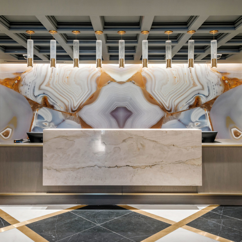 Merriman Anderson Architects: Modern Lighting Ideas. This hotel lobby has nine suspension lights right above the hotel reception desk.